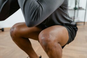 A man performing a squat exercise